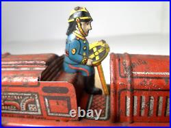 Arnold Tin Lithographed Windup Penny Toy Steam Fire Engine Truck